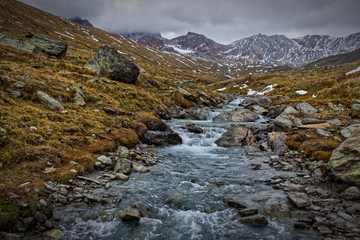 River in autumnal mountain landscape