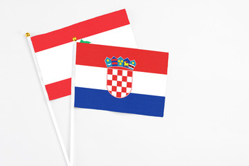 Croatia and Lebanon stick flags on white background. High quality fabric, miniature national flag....