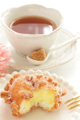 Sugar deep fried bread on dish with copy space