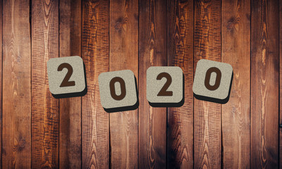 Happy New Year Stone Blocks 2020 Numbers on Table