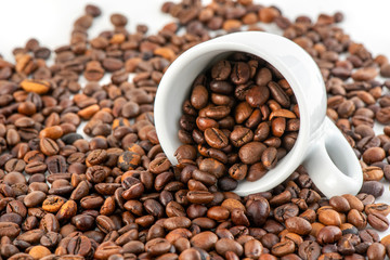 Cup of Coffee Beans Isolated on White Background, close-up