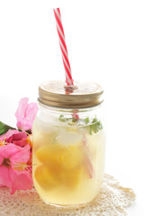 Frozen mango and mint in bottle for jar drink image