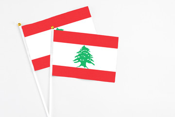 Lebanon and Lebanon stick flags on white background. High quality fabric, miniature national flag....