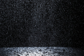 Dark background shot of rain falling - obrazy, fototapety, plakaty