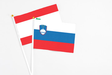 Slovenia and Lebanon stick flags on white background. High quality fabric, miniature national flag....