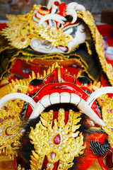 Wooden carved mask of Barong used for ceremonies in hindu temple in Bali-Indonesia