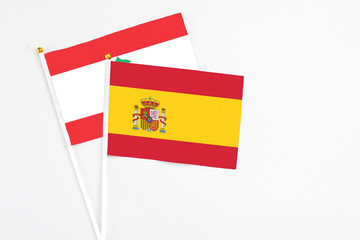Spain and Lebanon stick flags on white background. High quality fabric, miniature national flag....