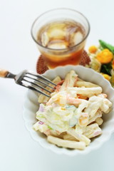 Macaroni and vegetable salad in bowl
