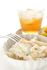 Macaroni and vegetable salad in bowl