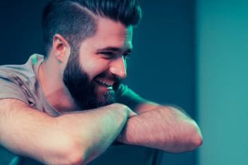 Neon portrait of a young attractive man