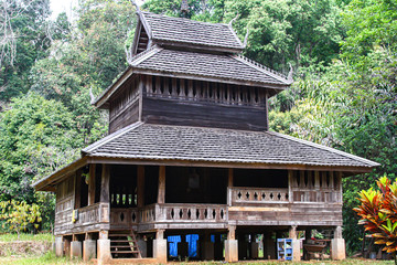 Old wooden buddhism temple in the jungle near to Chiang Mai, Thailand
