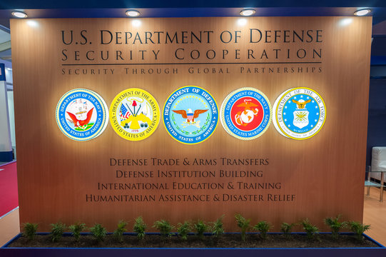 US Department of Defense with combined military signs at a trade event in Farnborough, UK - July 20, 2018