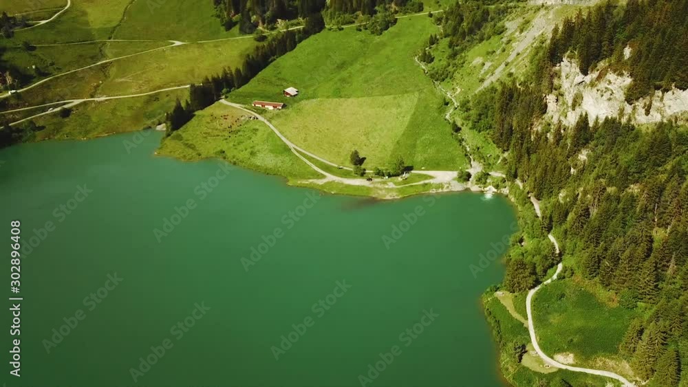 Poster Cinematic aerial shot of turquoise mountain lake in France - Posters