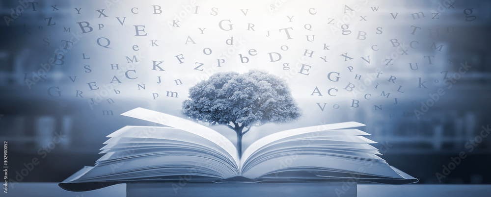 Poster books that are open on the table and the english alphabet float above the book. with a tree of wisdo