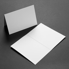 Rectangular postcard mock-up on black paper background