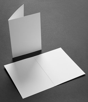 Rectangular postcard mock-up on black paper background