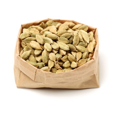 Green cardamom pods on white background