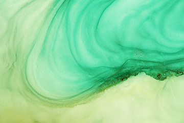 Alcohol ink sea texture. Contemporary art. Abstract art background. Multicolored bright texture. Fragment of artwork. Modern art. Inspired by the sky, as well as steam and smoke. Trendy wallpaper.