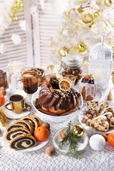 traditional cakes for Christmas on festive table