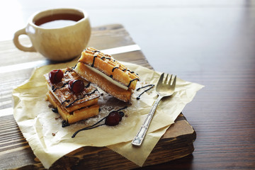 Viennese waffles with filling. Coffee table. A set of fragrant cookies for breakfast for the holiday.