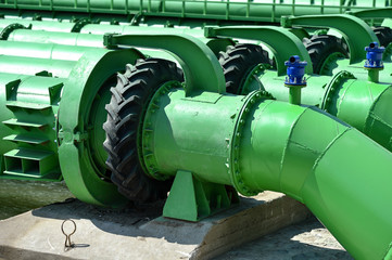 Industrial pipes used to pump water from a river to irrigate drought fields