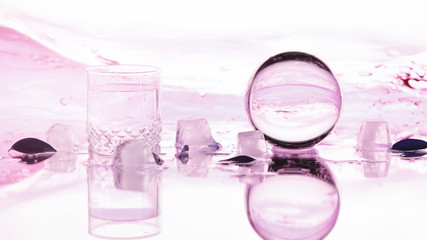 Tools for vision correction. Glasses and lenses with diopters on the background of splashes and blurry.