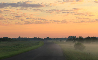 Fototapeta premium fog in the field at sunrise
