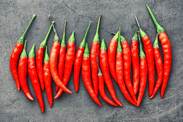 Hot red pepper. Chilean pepper on a black.