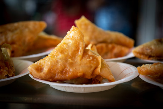 Indian samosa - a fried savory pastry - at Little India market in Singapore.