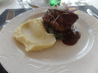 Beef steak served with mashed potato