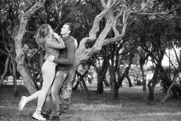 Beautiful young couple on date in the park