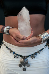 Woman Hands with big crystal. 