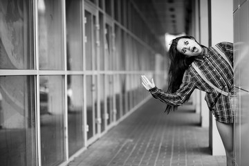 Girl in a clown makeup black and white