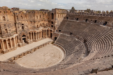 Theater at the Ancient City of Bosra, UNESCO World Heritage. and ruins of roman city Bosra in Syria