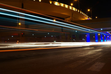 Fototapeta na wymiar Vector image of colorful light trails with motion blur effect, long time exposure.