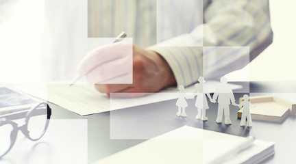 Insurance collateral concept. Life and property insurance. A businessman is preparing a document.