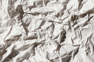 Crumbled white paper texture background. Creases and scratches. Old letter template. Craft paper for package and parcels. Packaging process.