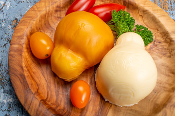 White and smoked yellow italian scamorza cheese