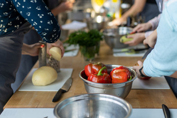 Unrecognizable large family preparing dinner for the holiday.