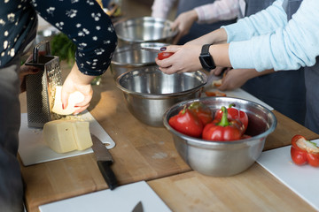 Unrecognizable large family preparing dinner for the holiday.