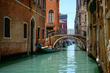 Fototapeta na wymiar Large canal in Venice Italy with Gondola