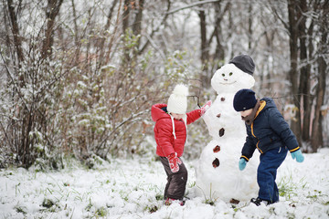 Children in winter park play