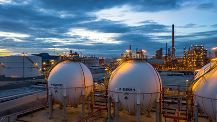 Aerial view oil storage tank terminal and tanker, petrol industrial .