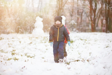 Children in winter park play