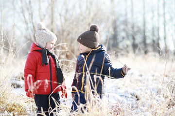 Children in winter park play