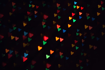 blurred heart shaped colorful bokeh background