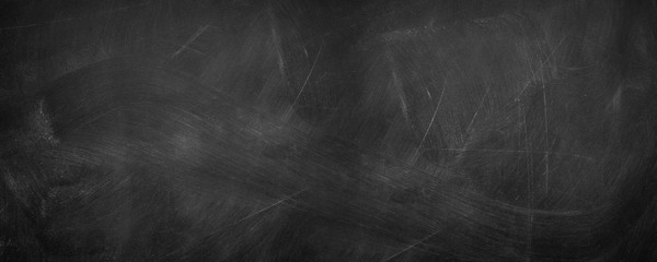 Abstract texture of chalk rubbed out on blackboard or chalkboard background, can be use as concept for school education, dark wall backdrop , design template , etc.