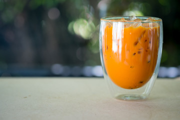 Close up glass of Thai milk tea