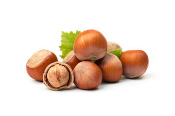 Hazelnut nut many leaves isolated on a white background as a packaging design element