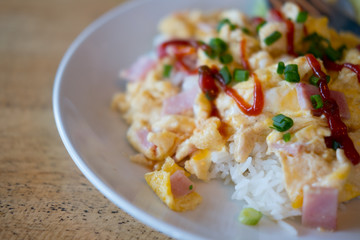 Omelet with bacon on rice